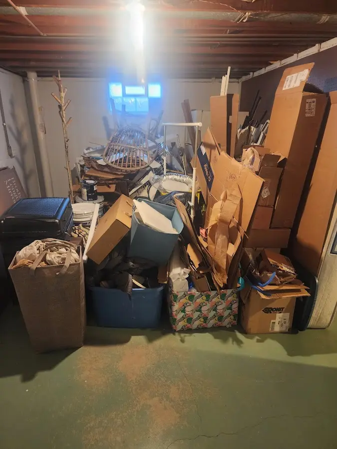 Roll-off dumpster container at job site for Yard Waste Dumpster Rental in Bellair-Meadowbrook Terrace